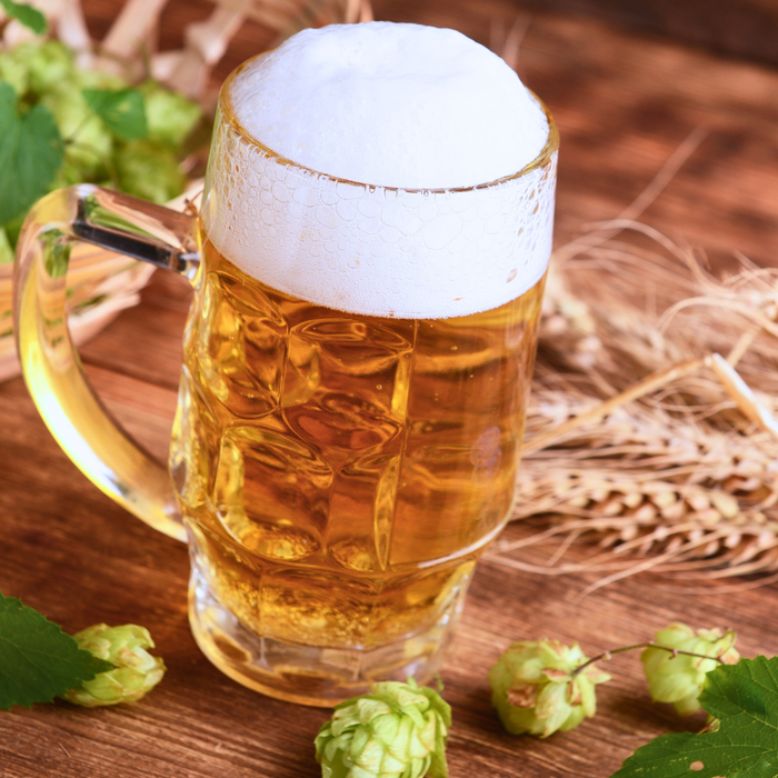 An image of fresh hops and a beer for the Home Grown Hops blog post.
