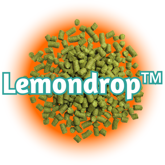 A pile of green US Lemondrop™ Hops T90 pellets with the brand name 'Lemondrop' prominently displayed in the centre.