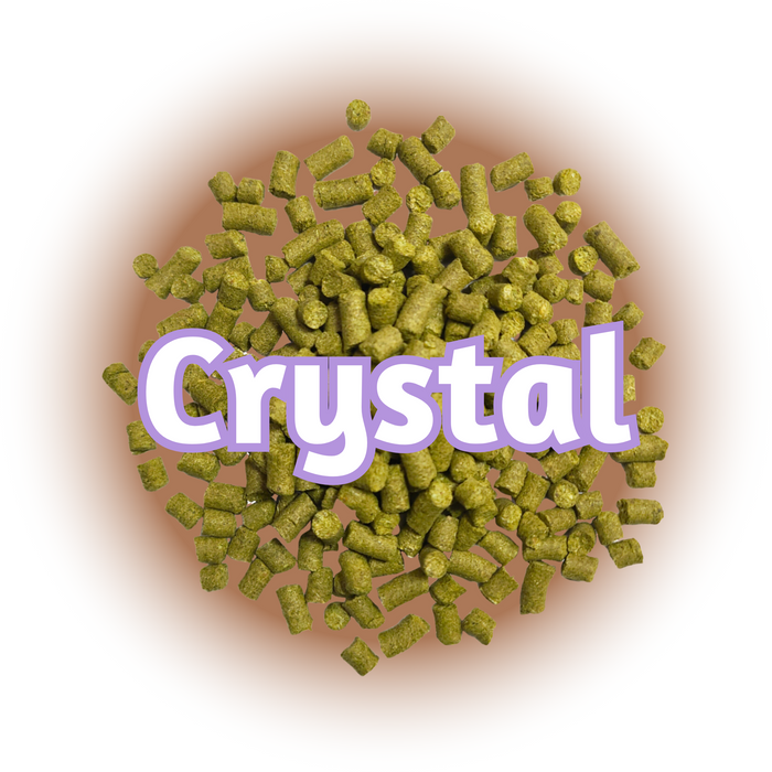 A close-up of US Crystal hops T90 Pellets with the word 'CRYSTAL' superimposed on top in bold purple letters.